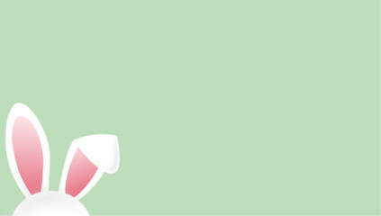 Hase mit Klappohr vor einem grünen Hintergrund