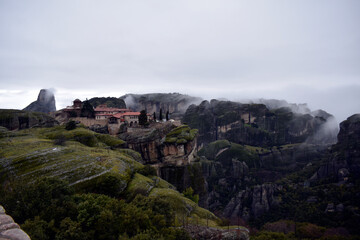 Meteora monastery covered by winters clouds