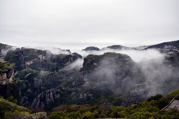 Meteora monastery covered by winters clouds