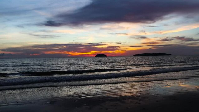 Beautiful Summer tropical sunset or sundown over the sea landscape at Tanjung aru Beach Kota Kinabalu, Sabah, Malaysia