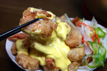 dip fried shrimp in lemon sauce.