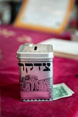 Jewish tzedakah or charity box for collecting financial donations for the poor and needy.