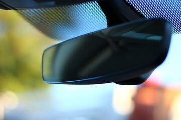 Car rear view mirror close up
