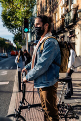 Obraz premium Man Using Bike in the City
