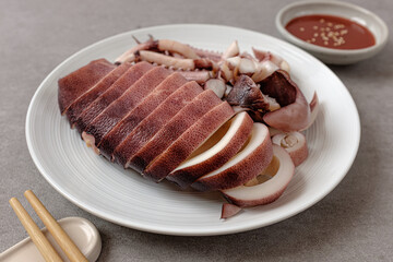 Squid sashimi, lightly blanched and eaten raw