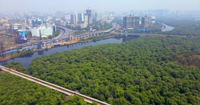 bandra kurla warli  bkc road flyover sealink western express highway india mumbai drone birds eye view cityscape mithi river mithi river dirty water.