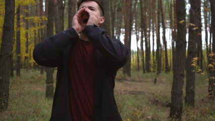 a lost man in the forest screams and asks for help