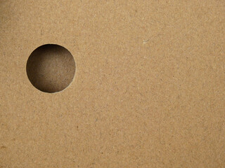 brown paper box with circle hole, texture background