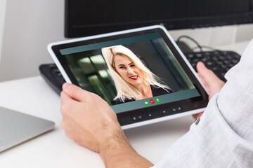 Close-up Of A Young man Chatting With Her Colleague