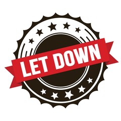 LET DOWN text on red brown ribbon stamp.