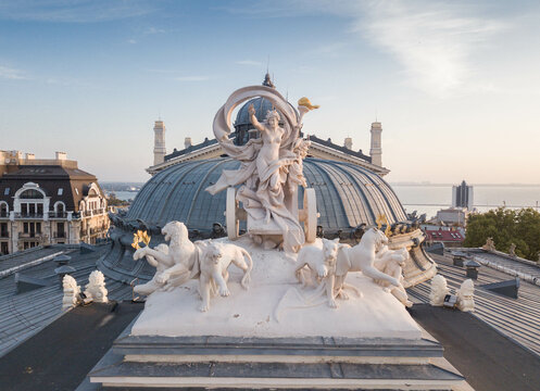 ODESA, UKRAINE-07 JULY, 2021: Roof statue of Opera and Ballet Theater Odesa Ukraine sightseeing. Aerial photography. Top view. Statue of Greek goddess Melpomene in a chariot drawn by four panthers.