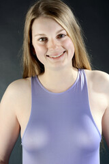 Portrait of a beautiful young woman tight top in studio