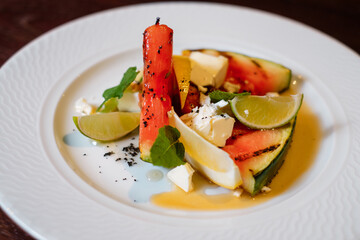 Salad of watermelon, cheese and lime.