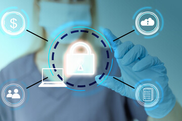 Unrecognizable doctor of medicine securing patient medical records across multiple devices via a...
