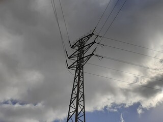 Power Line With A Cloudy Sky. Light consumption. Electricity