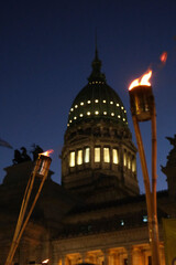 Torches lit in a protest in front of the Argentinean National Congress