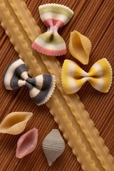 Various raw pasta and spagetti Traditional Italian cuisine. Top view.