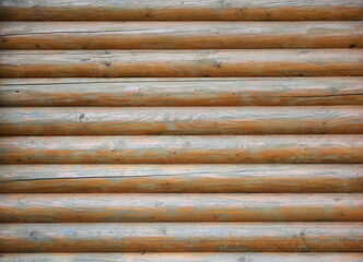 wooden fence. wall of wooden logs. background