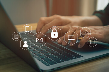 Businessmen protecting personal data on laptop and virtual interfaces, user typing login and password, cyber security concept.