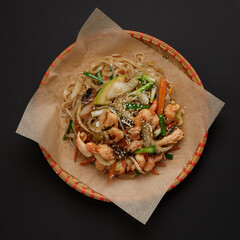 Spicy noodles with vegetables and saefood in vietnamese style top view