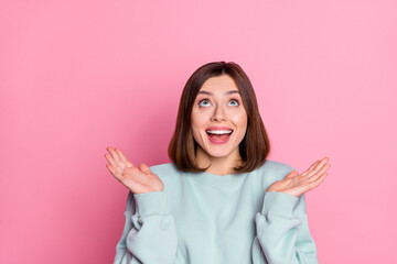 Photo of youth excited pretty lady look empty space unexpected information discount isolated over...