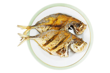 Deep fried fishes on plate on white table with clipping path, top view