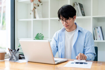 man working on laptop
