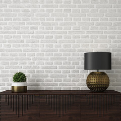 lamp and cactus in pot on wooden console in front of white brick wall