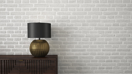 lamp on wooden console in front of white brick wall
