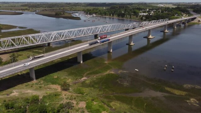 Panoramic aerial view of Barra de Santa Lucia Bridge in Uruguay, South America. 4K footage.