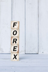 forex word or concept on wooden blocks, white wooden background