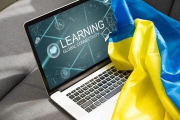laptop near ukraine flag. Learn english concept.
