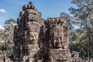 Fototapeta premium The sacred faces of ancient kings of Cambodia in Bayon temple of Angkor complex, Siem Reap, Cambodia