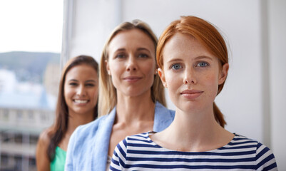 Obraz premium The corporate world. Cropped shot of corporate businesspeople in the office.