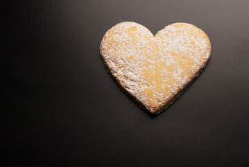 Shortbread in the shape of a heart isolated on white background.