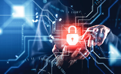 Businessman wearing casual wear is holding tablet device in hand