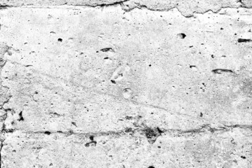 Texture of a concrete wall with cracks and scratches which can be used as a background