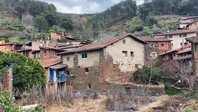 Set of old, traditional and rural houses in a peaceful green valley. Spanish tourism