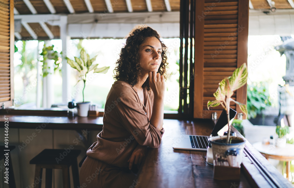 Poster contemplative caucaisan woman with modern laptop computer thoughtful looking away and thinking about