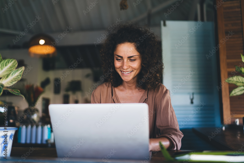 Aufkleber happy caucasian woman enjoying time for social networking on modern laptop computer using wifi inter