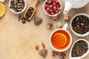 Set natural dried tea and teapot. Teatime. Tea ceremony concept. Top view. Flat lay.