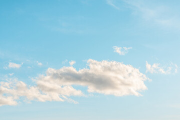 Nice cloudscape white fluffy clouds in the blue sky.Blue sky background with clouds