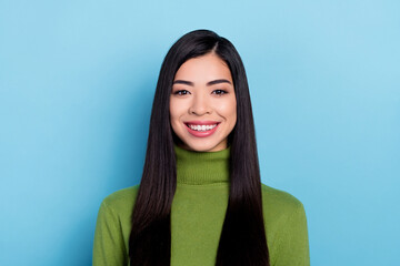 Photo of impressed millennial lady wear green sweater isolated on blue color background