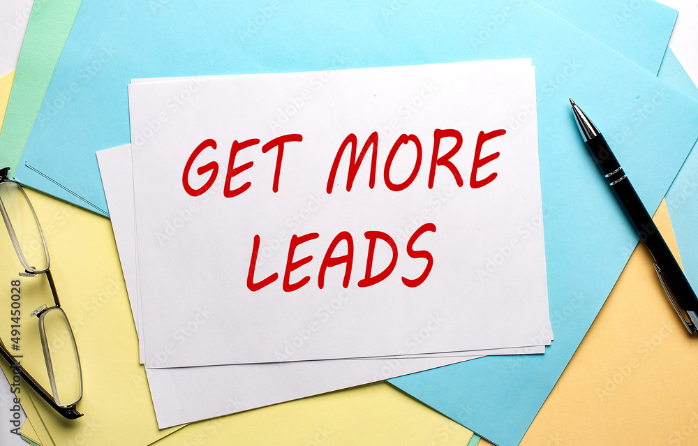 Poster get more leads text on paper on colorful paper background