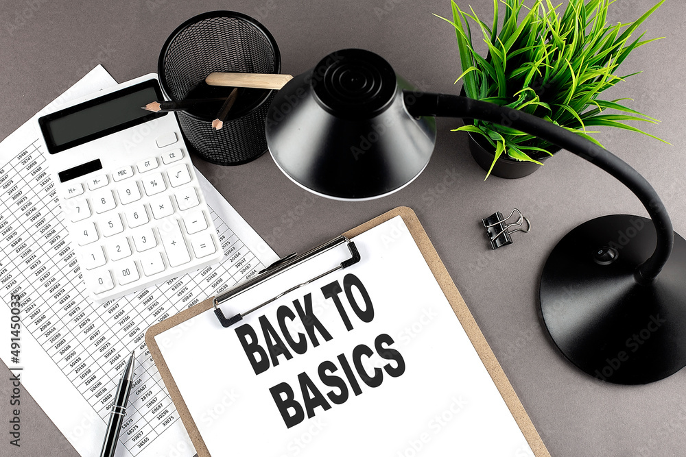 Aufkleber clipboard ,chart and calculator, lamp and workspace accessories on a grey table. top view , text bac