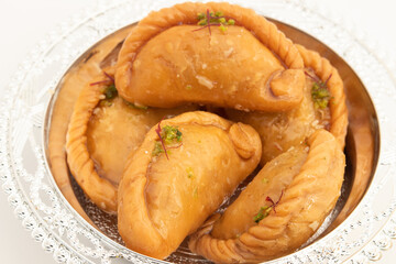 Indian Mithai Gujia Also Called Gujiya, Pirukiya, Pirukia, Pedakiya, Karanji, Basundi Gughra Made Of Suji Ghee Stuffed With Mawa Khoya Chasni Mava Khoa Is Enjoyed On Deepawali, Teez, Holi And Teej