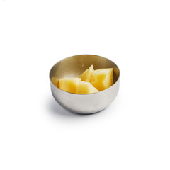 cheese sliced into pieces. snack. insulated on white