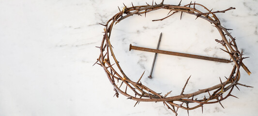 Crucifixion Of Jesus / religion easter background - Crown Of Thorns and rusty old nails in shape of...