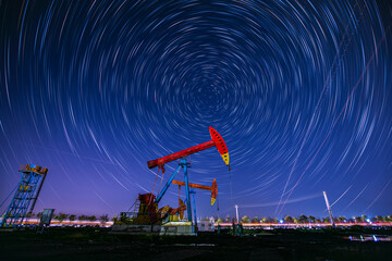 the oil pump and the trajectory of stars, Beam pumping unit under the stars