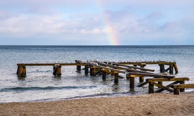 Photo sur Plexiglas La Baltique, Sopot, Pologne Winter rainbow seascape of Baltic sea with vintage jetty platform over beach of Gdynia Orlowo district of Tricity in Pomerania region of Poland